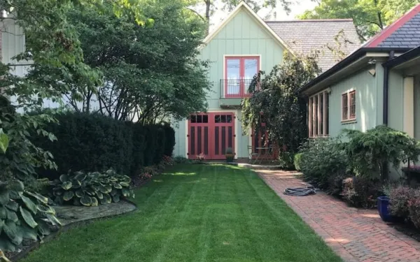 Italian Village Carriage House front lawn